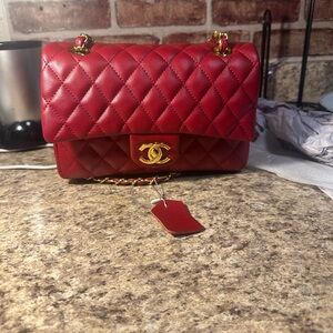 Caviar Classic Red Quilted Medium Shoulder Bag
10x7x3.5
Drop 22 1/2